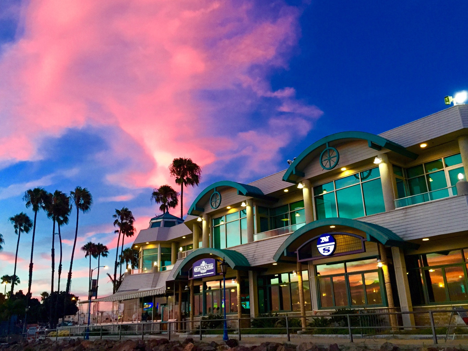 Waterfront commercial architecture at sunset