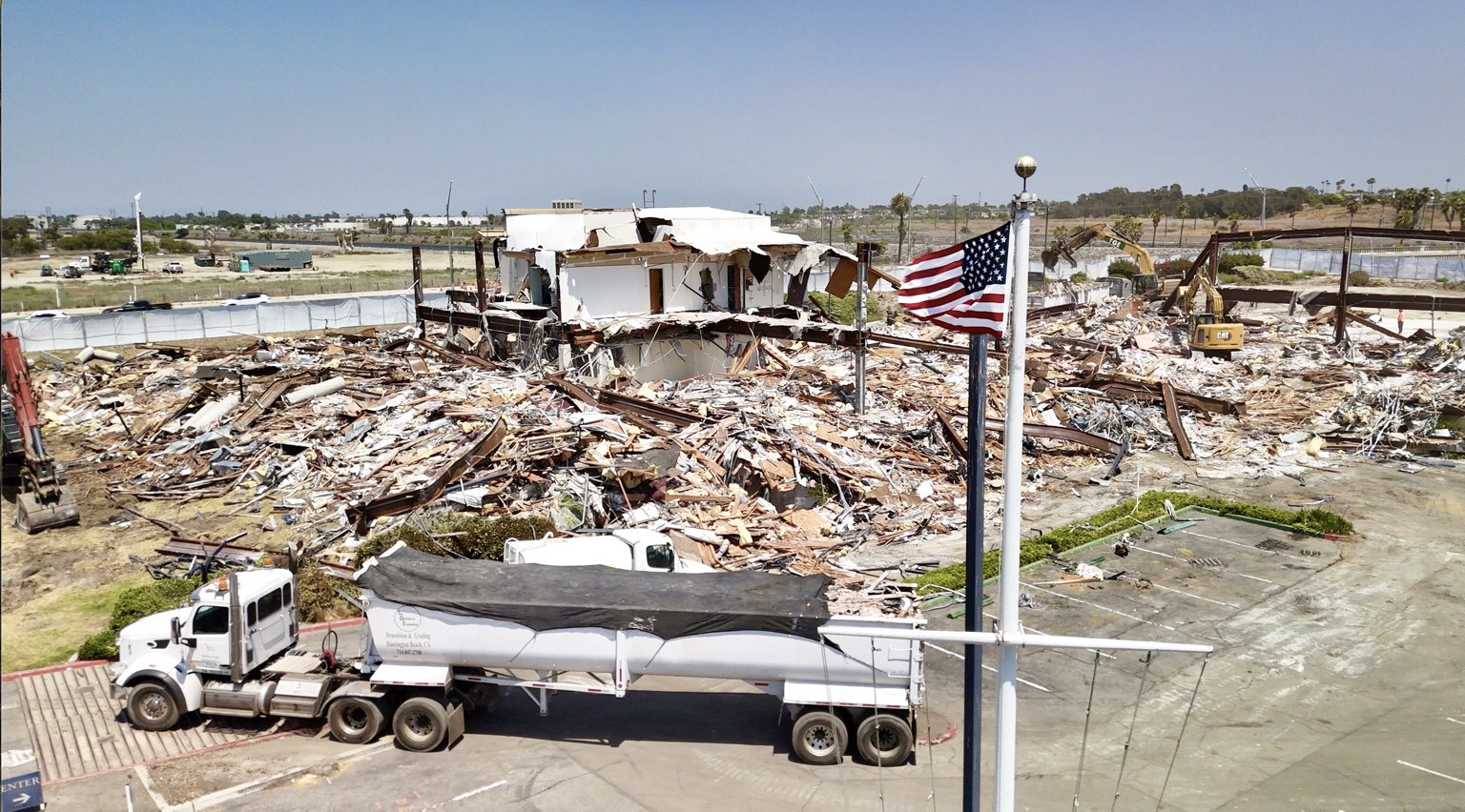 Congressional Place demolition with American flag
